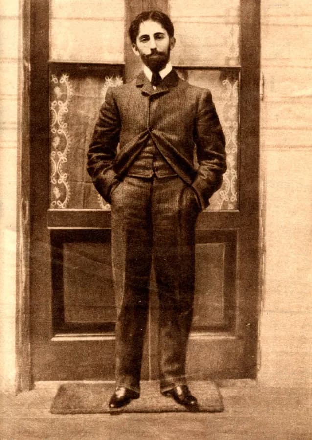 Horacio Quiroga standing beside a doorway in an 1897 portrait