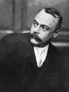 Schwarzweißporträt von Kenneth Grahame mit Schnurrbart und dunkler Jacke